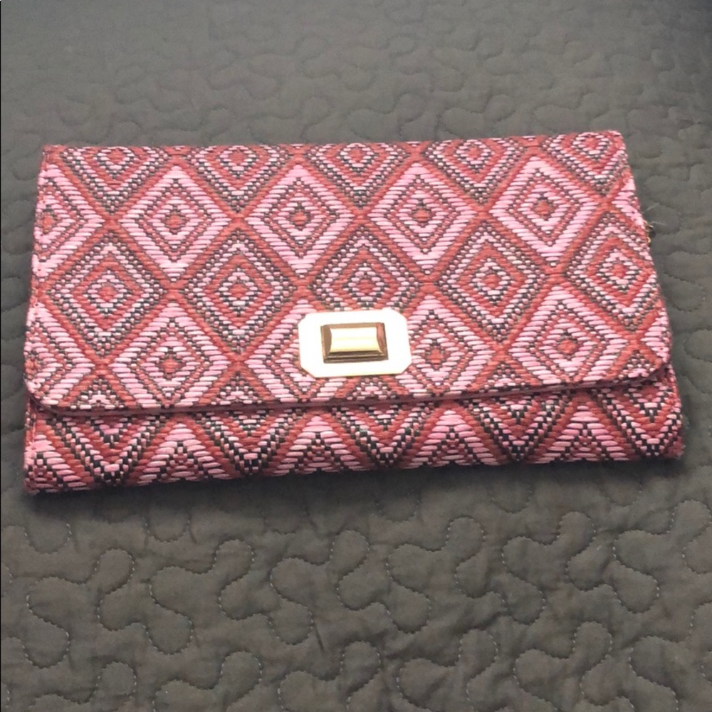 Pink geometric crossbody/clutch.